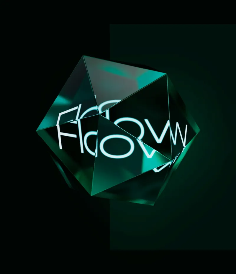 Green glass polyhedron with white lettering, cover art for the store rebuild project